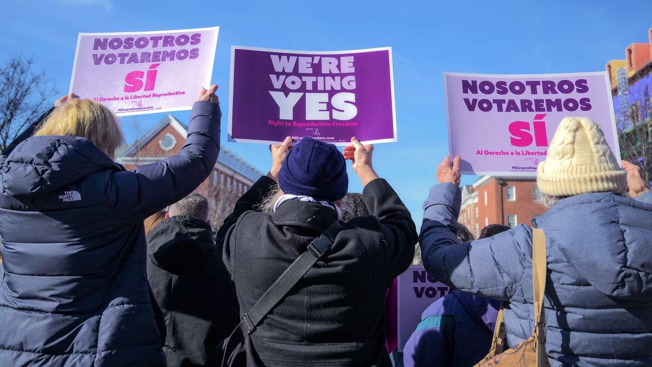Supporters hold posters during a rally launching FIRM, or Freedom in Reproduction Maryland, a group that campaigned in support of the constitutional amendment to protect abortion rights in Maryland.