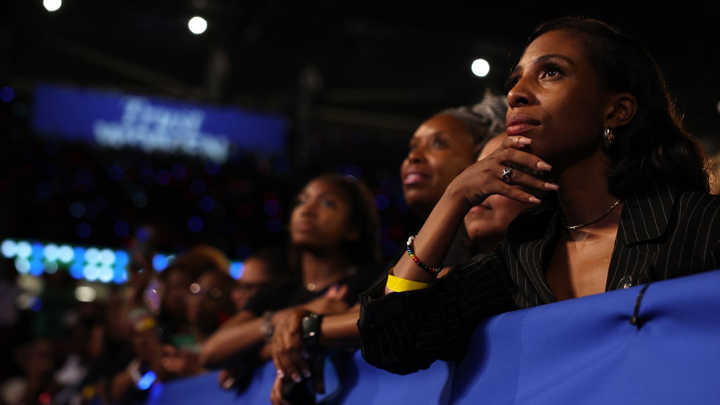 Supporters look on as Democratic presidential nominee Vice President Kamala Harris speaks during a campaign rally at Shell Energy Stadium on October 25 in Houston.