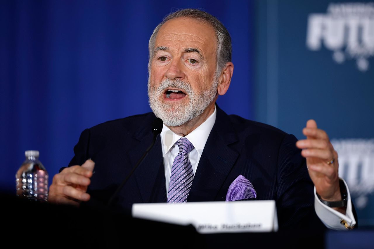 Former Arkansas Gov. Mike Huckabee moderates a roundtable discussion with Donald Trump at the Drexelbrook Catering & Event Center on October 29, in Drexel Hill, Pennsylvania.