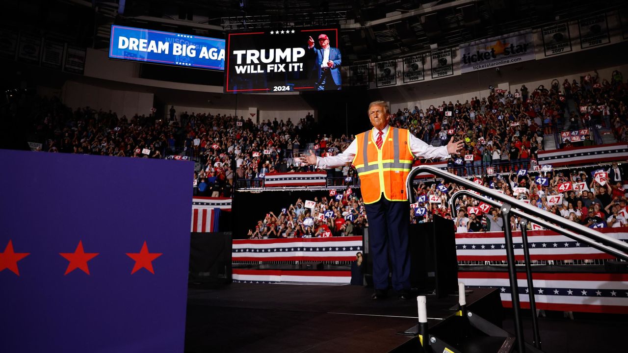 Former President Donald Trump greets supporters during a campaign event at the Resch Center on October 30 in Green Bay, Wisconsin. Trump said he will protect women, whether they “like it or not,” during the rally.