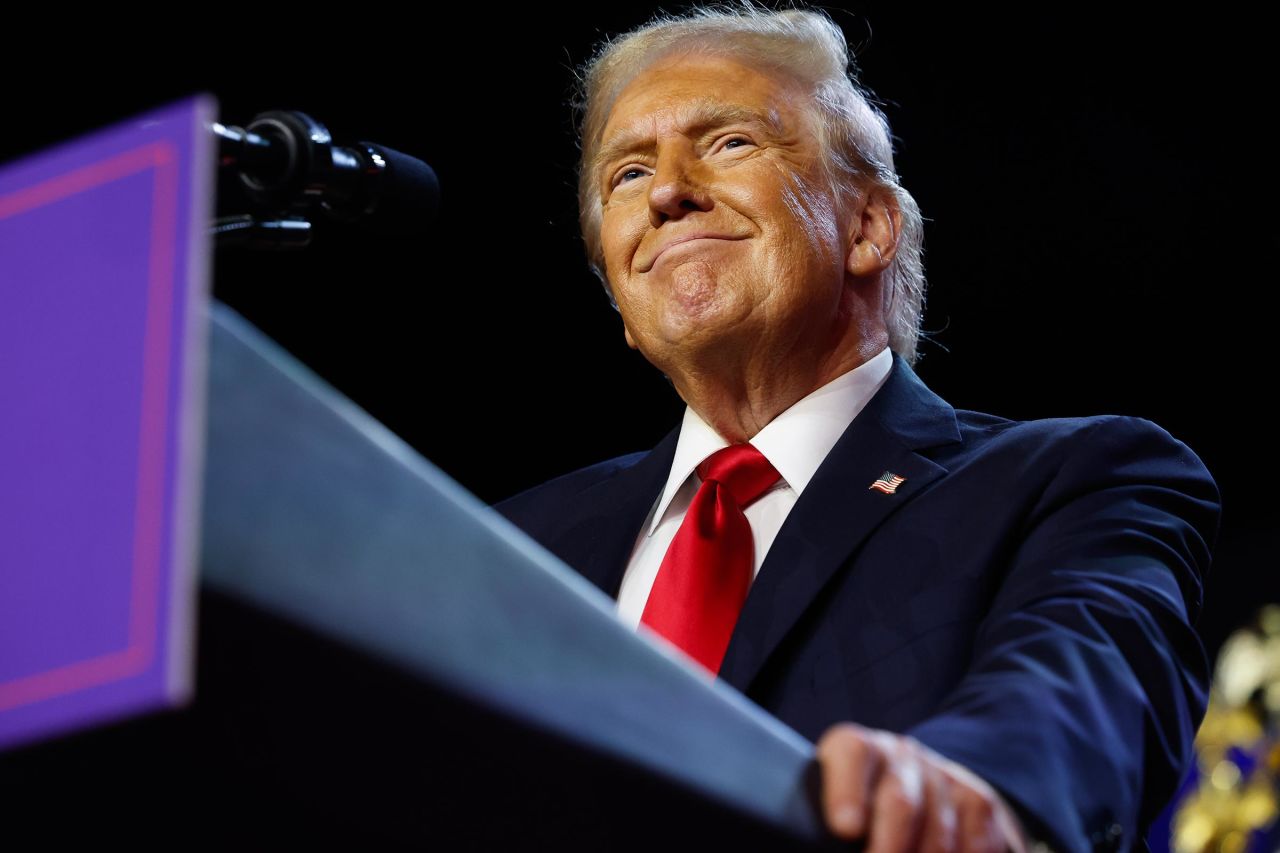 Former President Donald Trump arrives to speak during an election night event at the Palm Beach Convention Center on November 6, in West Palm Beach, Florida. 