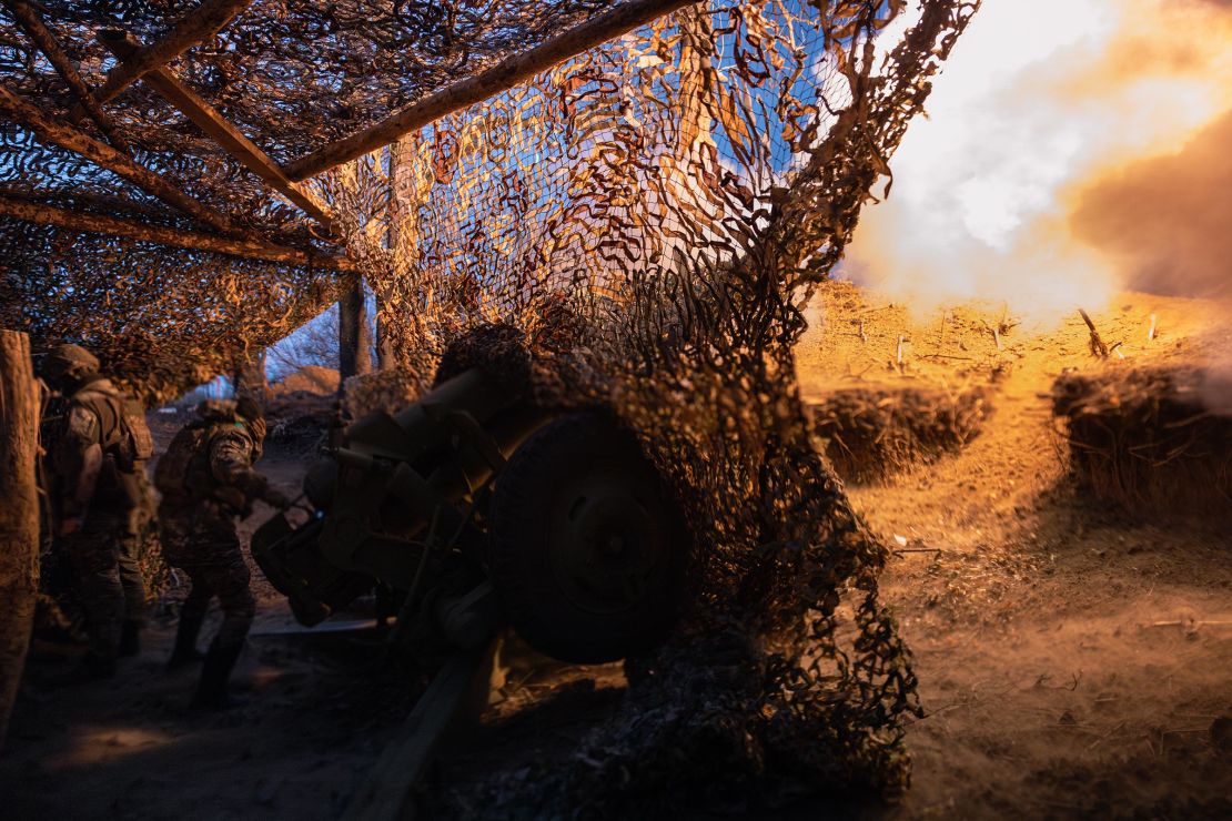 Members of the unit Dnipro One of the Joint Assault Brigade of the National Police of Ukraine "Luty" operate a Soviet-era howitzer D-30 on November 9, near Toretsk, Ukraine.