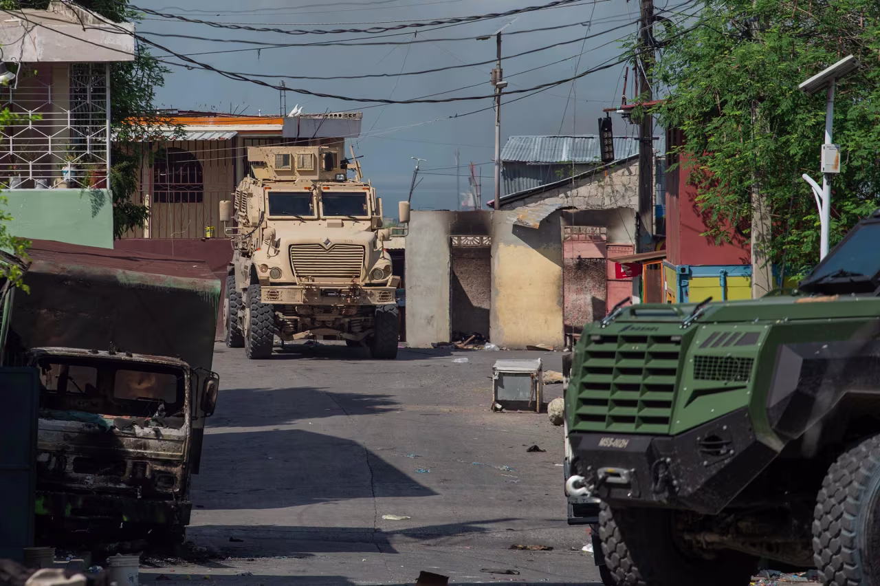 A Kenyan Police armored vehicle patrols the Solino district, which fell under the control of the Viv Ansanm gang alliance, in Port-au-Prince on November 16, 2024. 