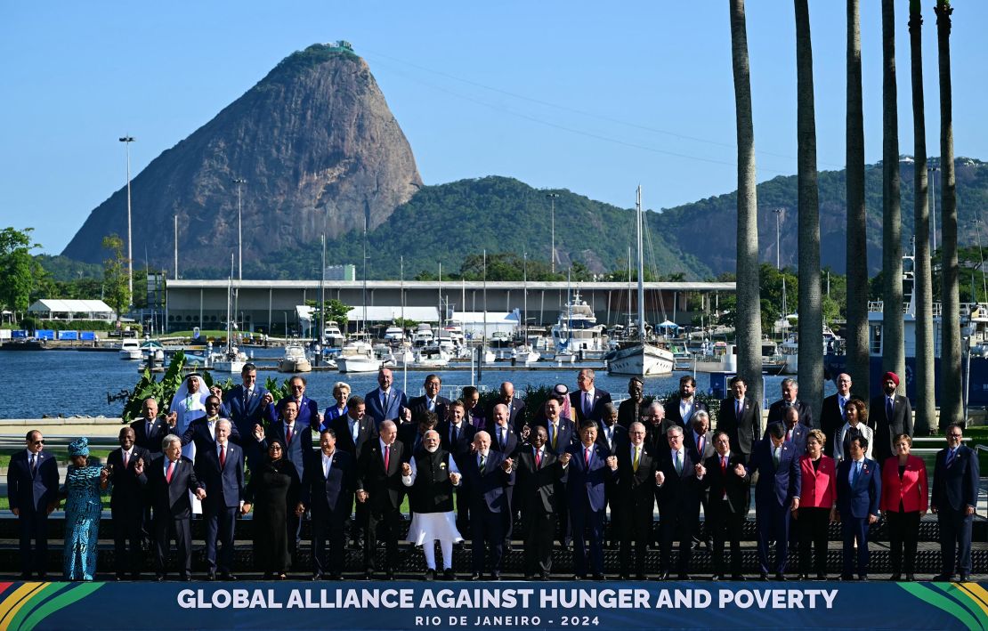 G20 leaders pose for a group photo in Rio de Janeiro on November 18, 2024. Biden and a handful of other leaders missed the photo, arriving to the site as the others were disbanding.