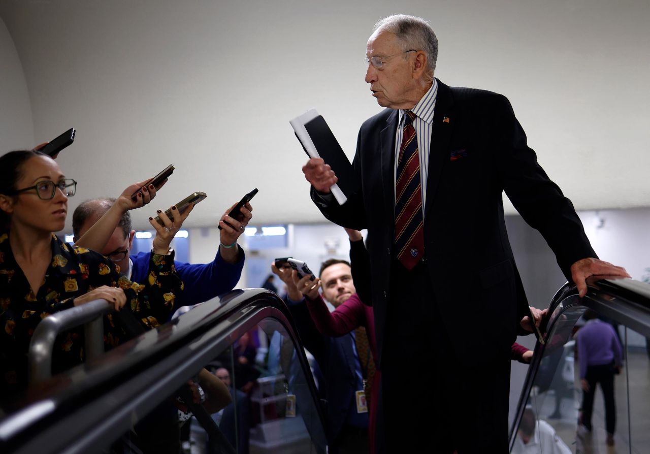Sen. Charles Grassley speaks to reporters as he walks to a Senate luncheons at the US Capitol on November 19 in Washington, DC.
