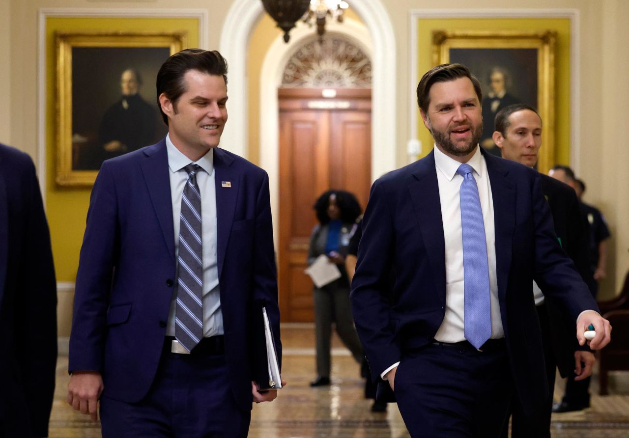 Former Rep. Matt Gaetz, the President-elect Donald Trump's nominee to be Attorney General, walks alongside Vice President-elect JD Vance as they arrive for meetings with Senators at the US Capitol on November 20 in Washington, DC.