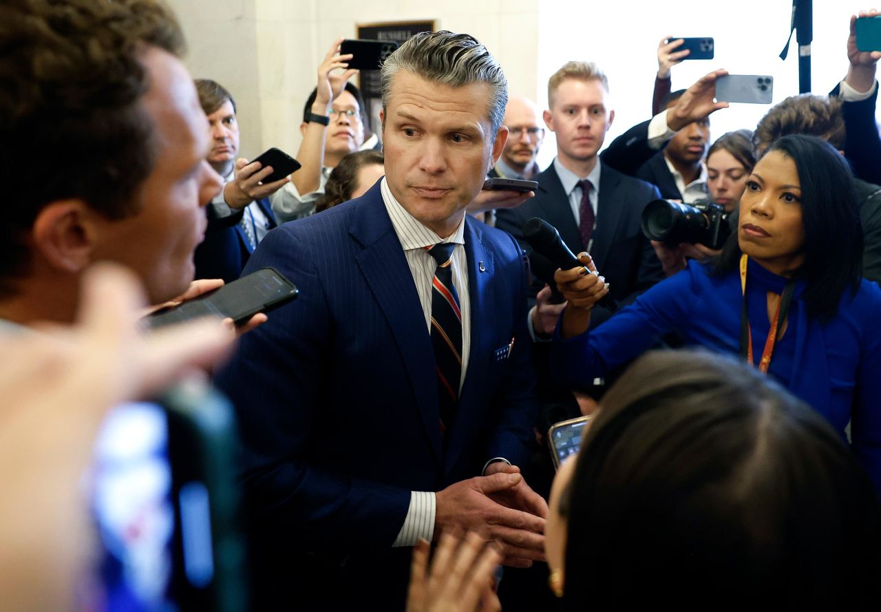 President-elect Donald Trump's nominee to be Secretary of Defense Pete Hegseth speaks to reporters as he leaves the Russell Senate Office Building on November 21, 2024 in Washington, DC. 