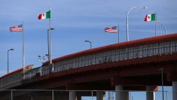 A bridge with Mexican and US flags is seen on the border of El Paso, Texas, United States, with Ciudad Juarez, Chihuahua State, Mexico, on November 28.