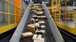 Packages prepared for shipping on a conveyer belt at an Amazon Fulfillment center on Cyber Monday in Robbinsville, New Jersey, on December 2, 2024. 
