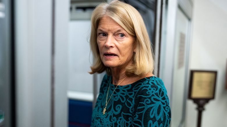 Sen. Lisa Murkowski speaks with reporters in the Senate subway in the US Capitol on Wednesday, December 4, 2024.