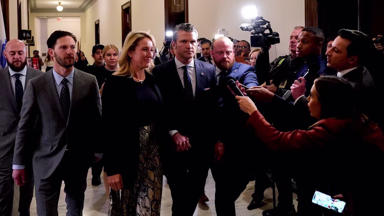 Pete Hegseth and his wife Jennifer Rauchet arrive for a meeting with Sen. Joni Ernst on Capitol Hill in Washington, DC, on Wednesday.