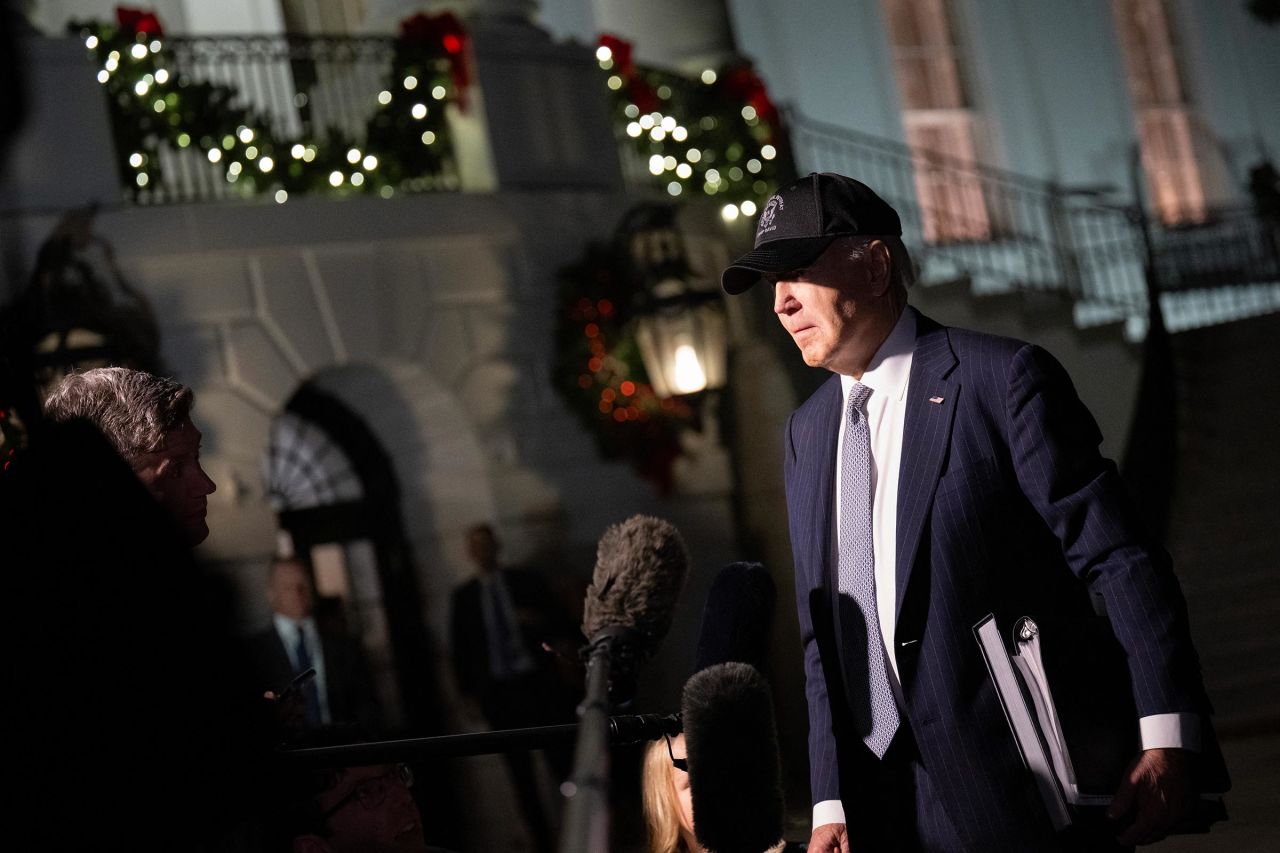 President Joe Biden speaks to reporters as he departs the White House enroute to Wilmington, Delaware, on December 17, in Washington, DC.