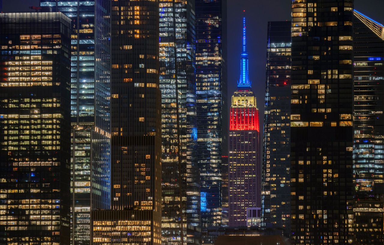 The Empire State Building in New York is illuminated in red, white and blue to mark Carter's death on Sunday.