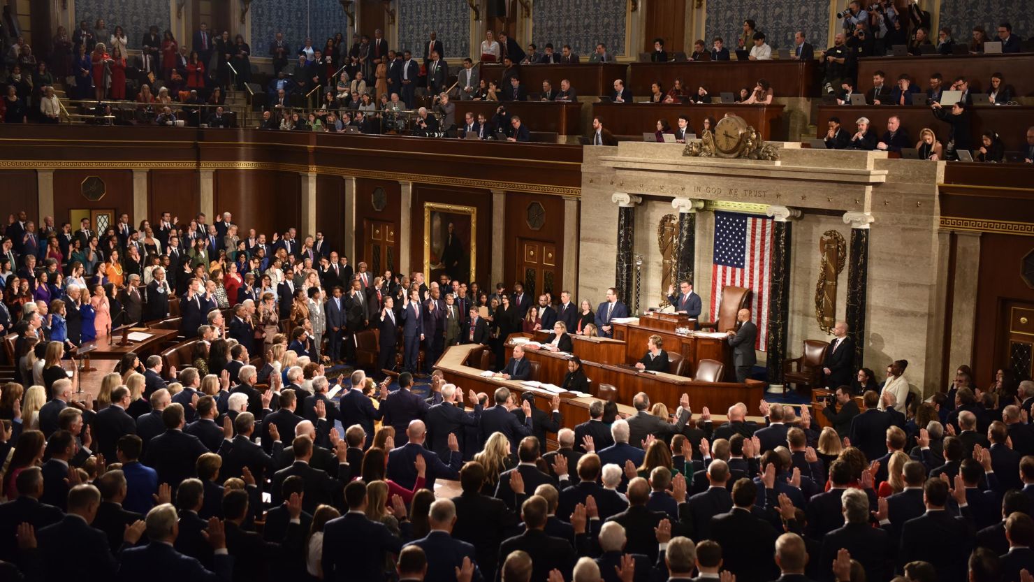 House Speaker Mike Johnson and members of the House take the oath of office during the 119th Congress at the US Capitol on January 3 in Washington, DC. 