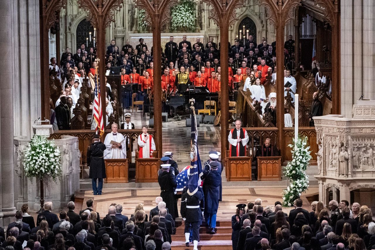 The casket bearing the remains of former President Jimmy Carter arrives inside Washington National Cathedral for his state funeral on January 9, in Washington, DC. 