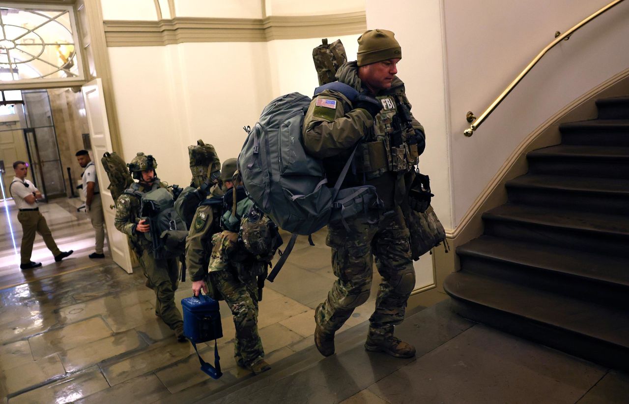 Law enforcement enters the US Capitol to assist with security on January 6, 2025 in Washington, DC. 