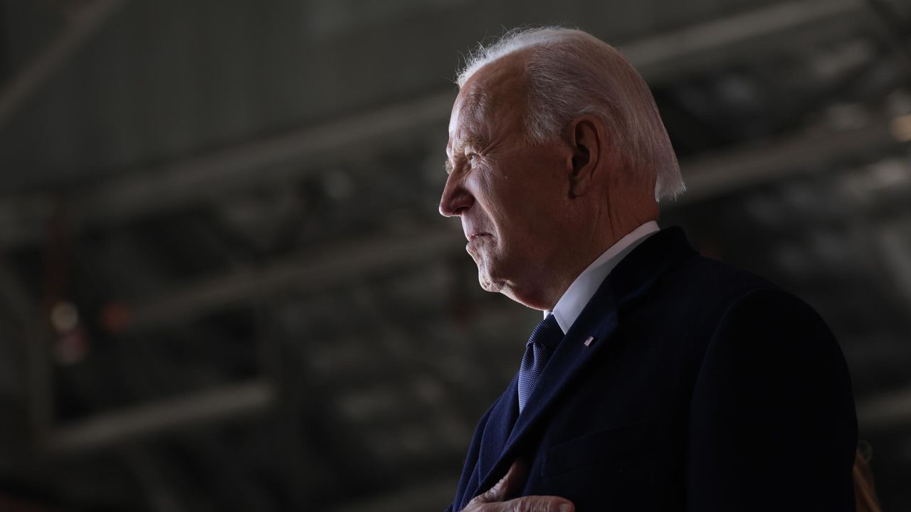 Former President Joe Biden gestures while arriving at Joint Base Andrews following inauguration ceremonies on January 20 in Joint Base Andrews, Maryland. 