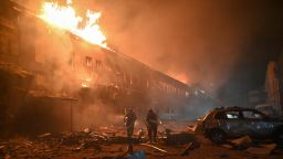 Rescuers of the State Emergency Service work to extinguish a fire in a building after a drone strike in Kharkiv, Ukraine, on January 28.