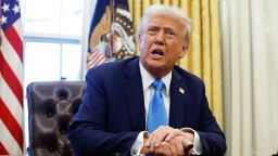 President Donald Trump speaks with reporters in the Oval Office of the White House on February 4, 2025 in Washington, DC.