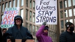 Protesters rally outside of the Theodore Roosevelt Federal Building headquarters of the US Office of Personnel Management on February 5, in Washington, DC. 