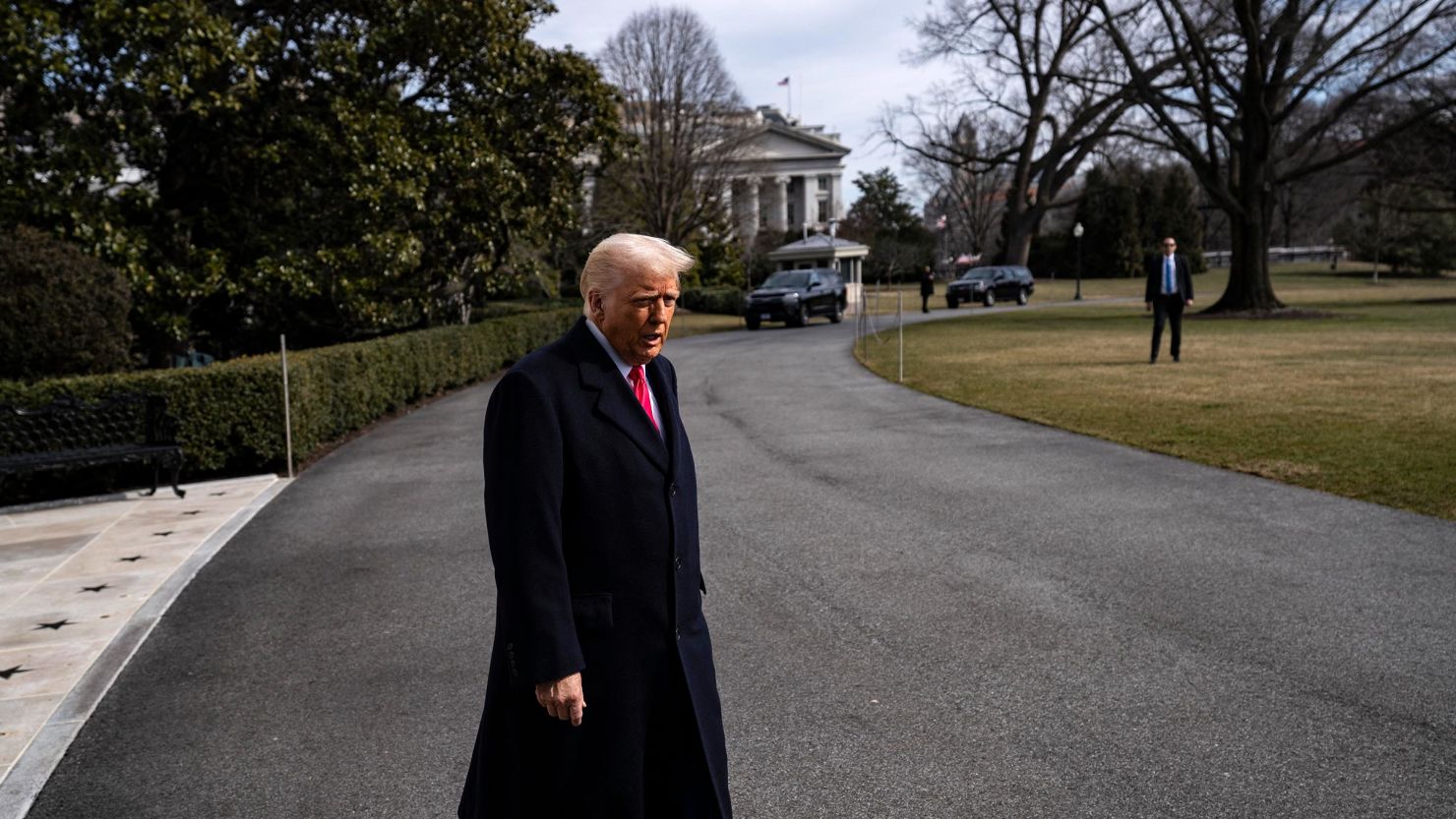 President Donald Trump walks to the South Lawn prior to departing the White House on February 22 in Washington, DC.