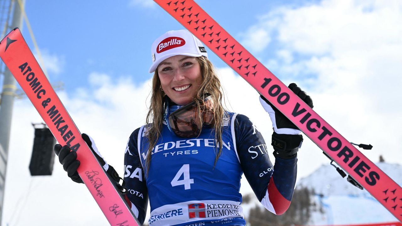 Mikaela Shiffrin, winner, poses with skis marking her "100 Victories" after the podium ceremony of the Women's Slalom event during the FIS Alpine Skiing World Cup in Sestriere, Italy, on February 23, 2025.