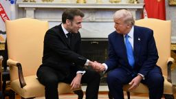 President Donald Trump, right, meets with French President Emmanuel Macron in the Oval Office of the White House in Washington, DC, on February 24.
