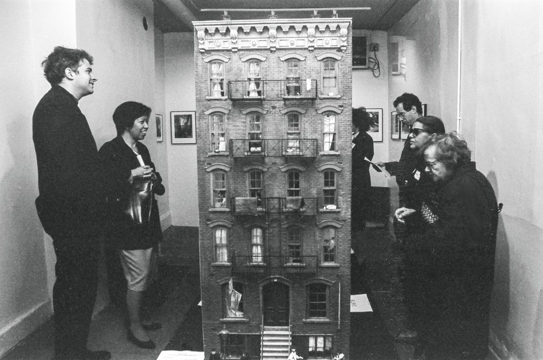 View of attendees as they look at an exhibit during the opening day ceremony at the Lower East Side Tenement Museum in New York on September 1, 1992.