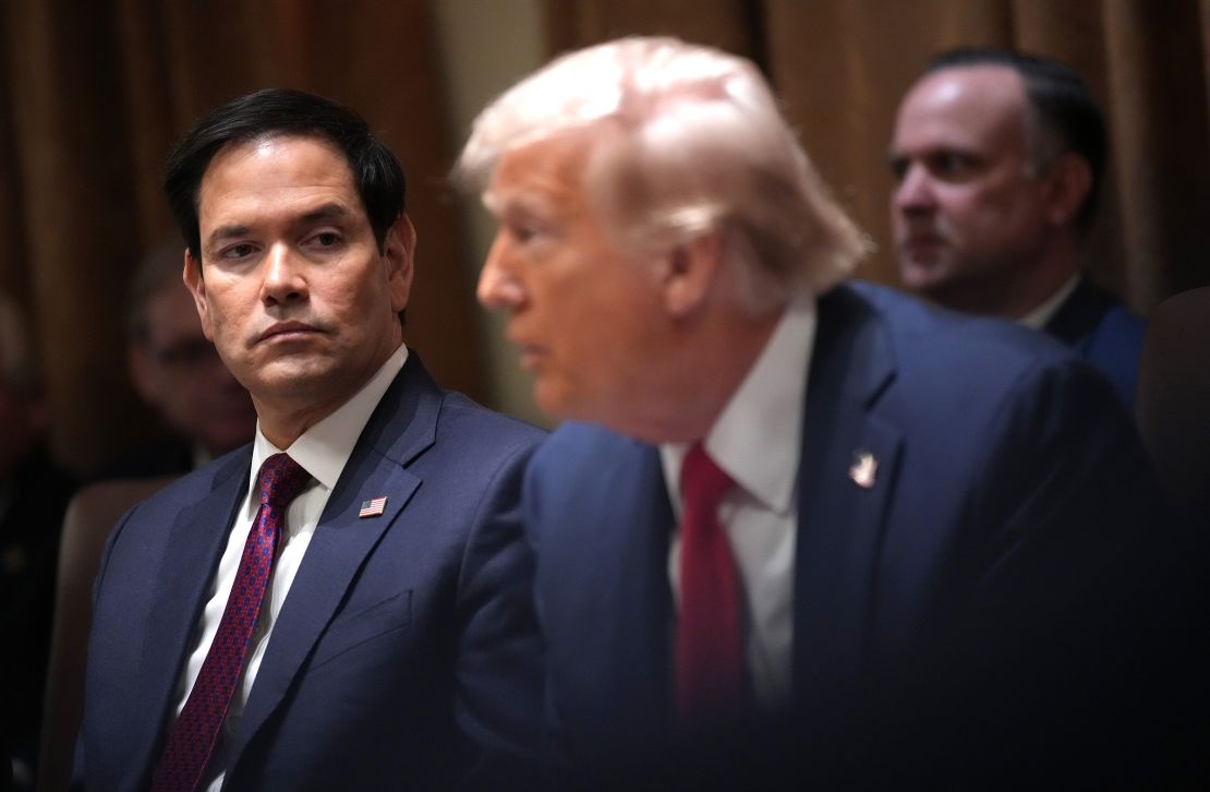 Secretary of State Marco Rubio listens as President Donald Trump delivers remarks during a Cabinet Meeting at the White House on February 26, 2025 in Washington, DC. 