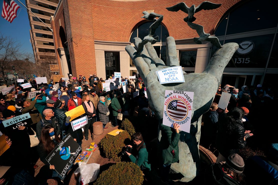 Hundreds of demonstrators gather to protest against Department of Government Efficiency (DOGE) cuts outside the headquarters of the National Oceanic and Atmospheric Administration on March 3, in Silver Spring, Maryland.