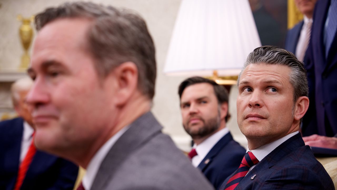 National Security Adviser Michael Waltz, Vice President JD Vance, and Defense Secretary Pete Hegseth, listen to a question from a reporter during a meeting in the Oval Office of the White House on March 13, in Washington, DC. 