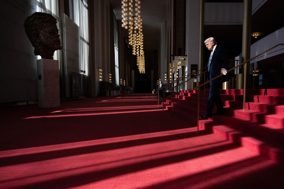 President Donald Trump walks though the Hall of Nations as he visits the John F. Kennedy Center for the Performing Arts in Washington, DC, on March 17.