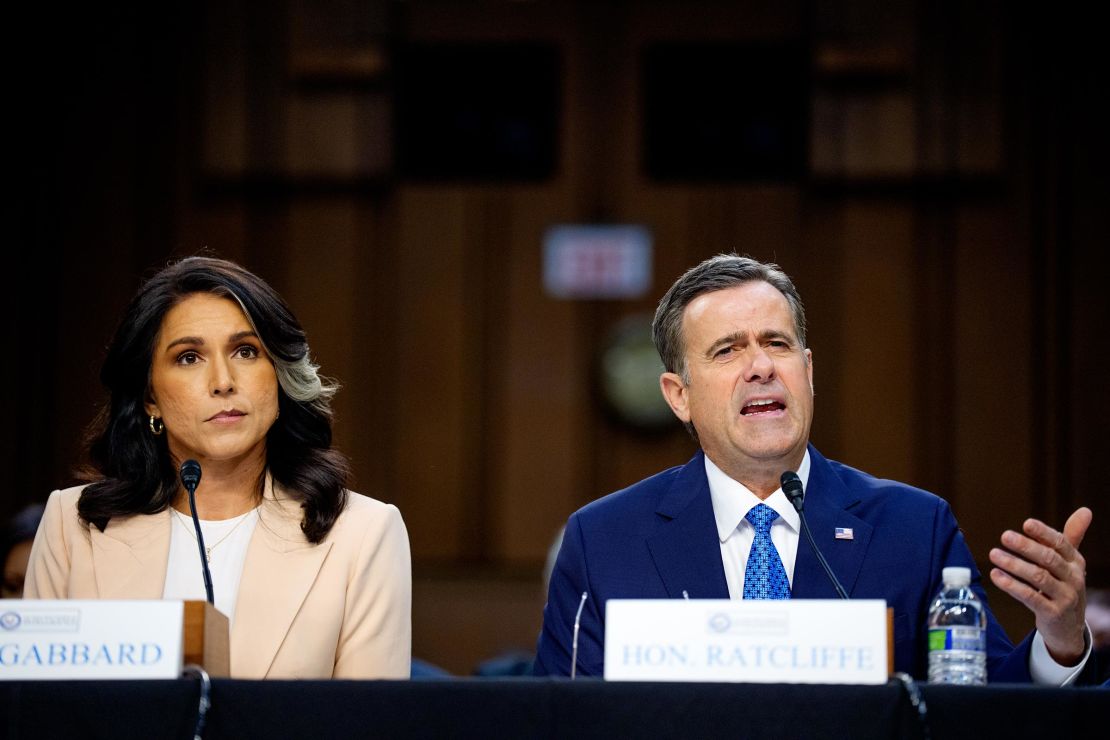 Central Intelligence Agency Director John Ratcliffe, accompanied by Director of National Intelligence Tulsi Gabbard, speaks during a Senate Committee on Intelligence Hearing on March 25 in Washington, DC.