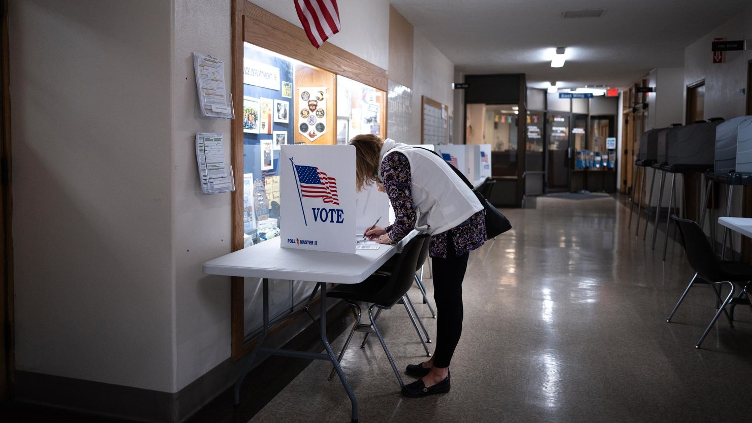 A resident participates in in-person early voting at the Municipal Building on March 26 in Kenosha, Wisconsin.