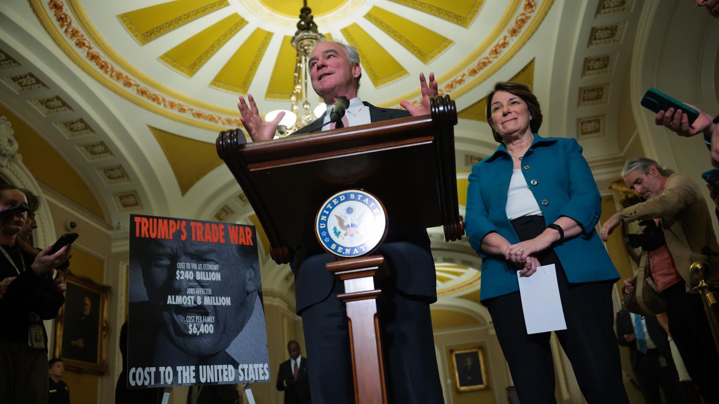 Sen. Tim Kaine speaks to reporters alongside Sen. Amy Klobuchar following the weekly Democratic Senate policy luncheon at the US Capitol on April 1, in Washington, DC.