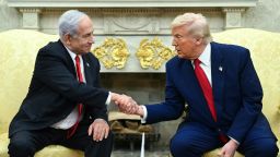 President Donald Trump shakes hands with Israeli Prime Minister Benjamin Netanyahu during a meeting in the Oval Office of the White House in Washington, DC, on April 7.