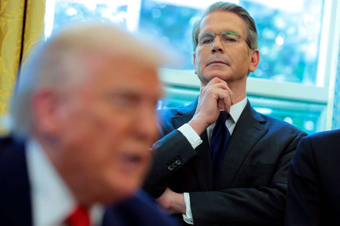 Bessent looks on as Trump signs executive orders in the Oval Office on April 9.