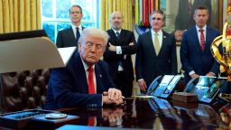President Donald Trump prepares to sign executive orders as Treasury Secretary Scott Bessent, Secretary of Commerce Howard Lutnick, Interior Secretary Doug Burgum and Transportation Secretary Sean Duffy look on in the Oval Office of the White House on April 9 in Washington, DC.