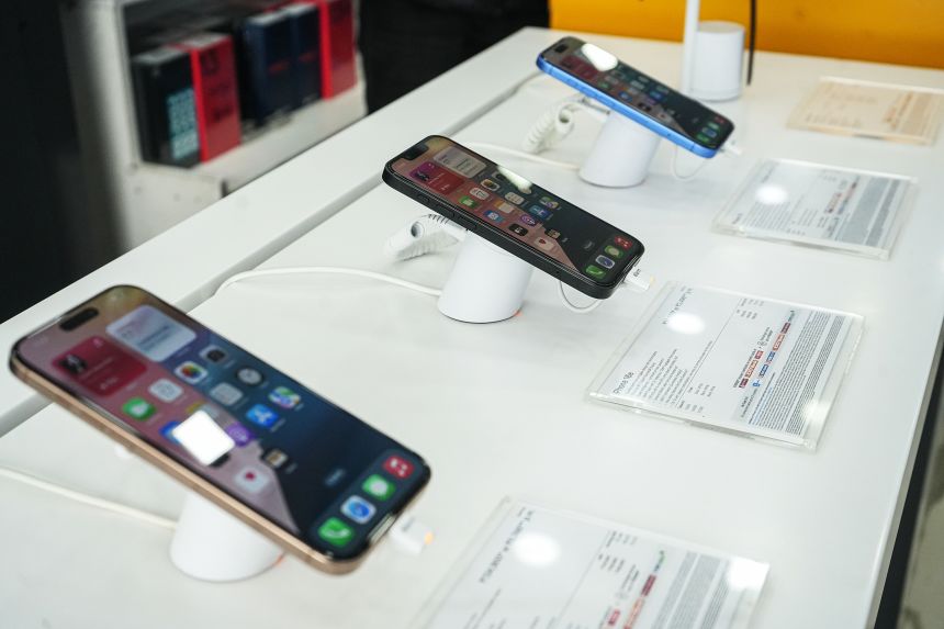 Apple's iPhone 16 series are displayed for sale at an electronics store in Srinagar, Jammu and Kashmir, on April 17.