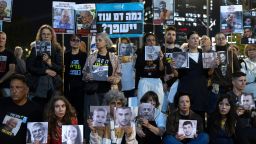 Protesters hold photos of hostages who were killed in Hamas captivity during Israel's annual Memorial Day for the fallen soldiers who died in the nation's conflicts and victims of nationalistic attacks on April 29 in Tel Aviv, Israel.