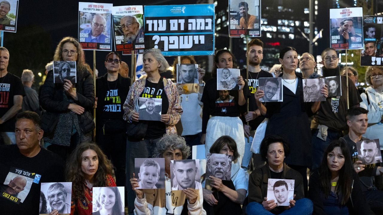 Protesters hold photos of hostages who were killed in Hamas captivity during Israel's annual Memorial Day for the fallen soldiers who died in the nation's conflicts and victims of nationalistic attacks on April 29 in Tel Aviv, Israel.