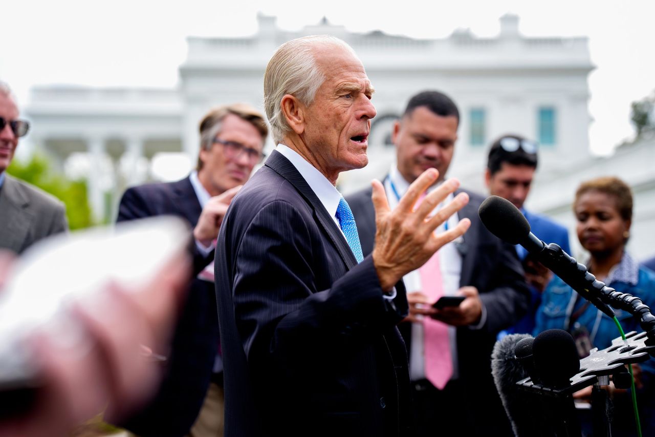 Peter Navarro speaks to members of the media following a television interview on the North Lawn of the White House on April 30 in Washington, DC.