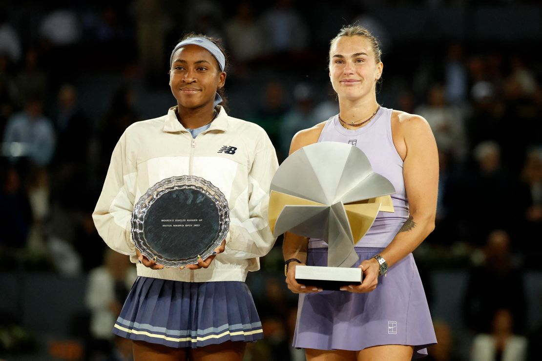 Belarus' Aryna Sabalenka, right, poses with her trophy after winning Coco Gauff during their 2025 WTA Tour Madrid Open tennis tournament singles final match at the Caja Magica in Madrid, on May 3.