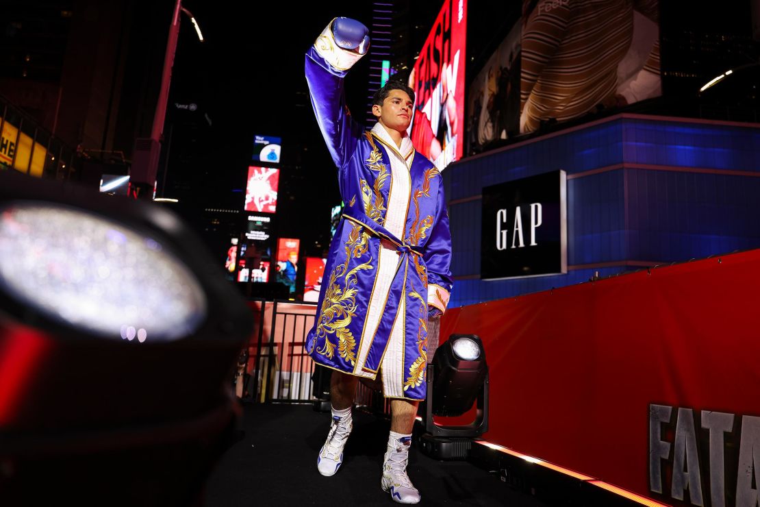 Ryan Garcia walks out to the ring before a fight against Rolly Romero for the WBA Welterweight title in Times Square on May 2 in New York City.