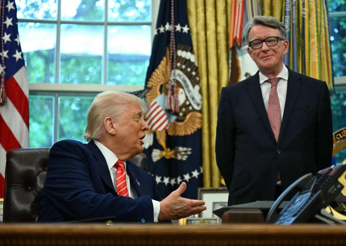 President Donald Trump shakes hands with British ambassador to the United States Peter Mandelson after making a trade announcement in the Oval Office of the White House in Washington, DC, on May 8.