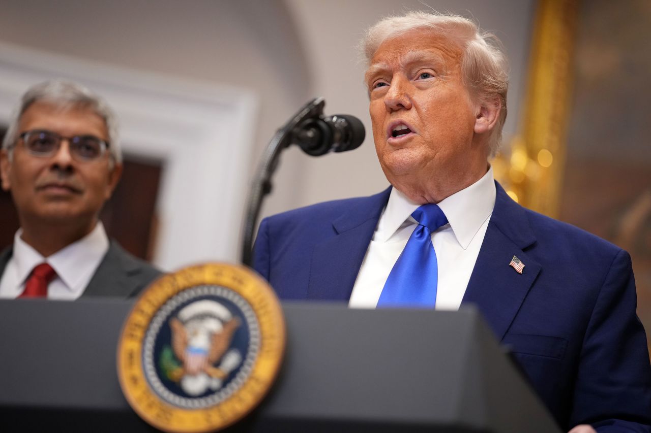 President Donald Trump, joined by National Institutes of Health (NIH) Director Jay Bhattacharya, speaks during a press conference in the Roosevelt Room of the White House on May 12, 2025, in Washington, DC.
