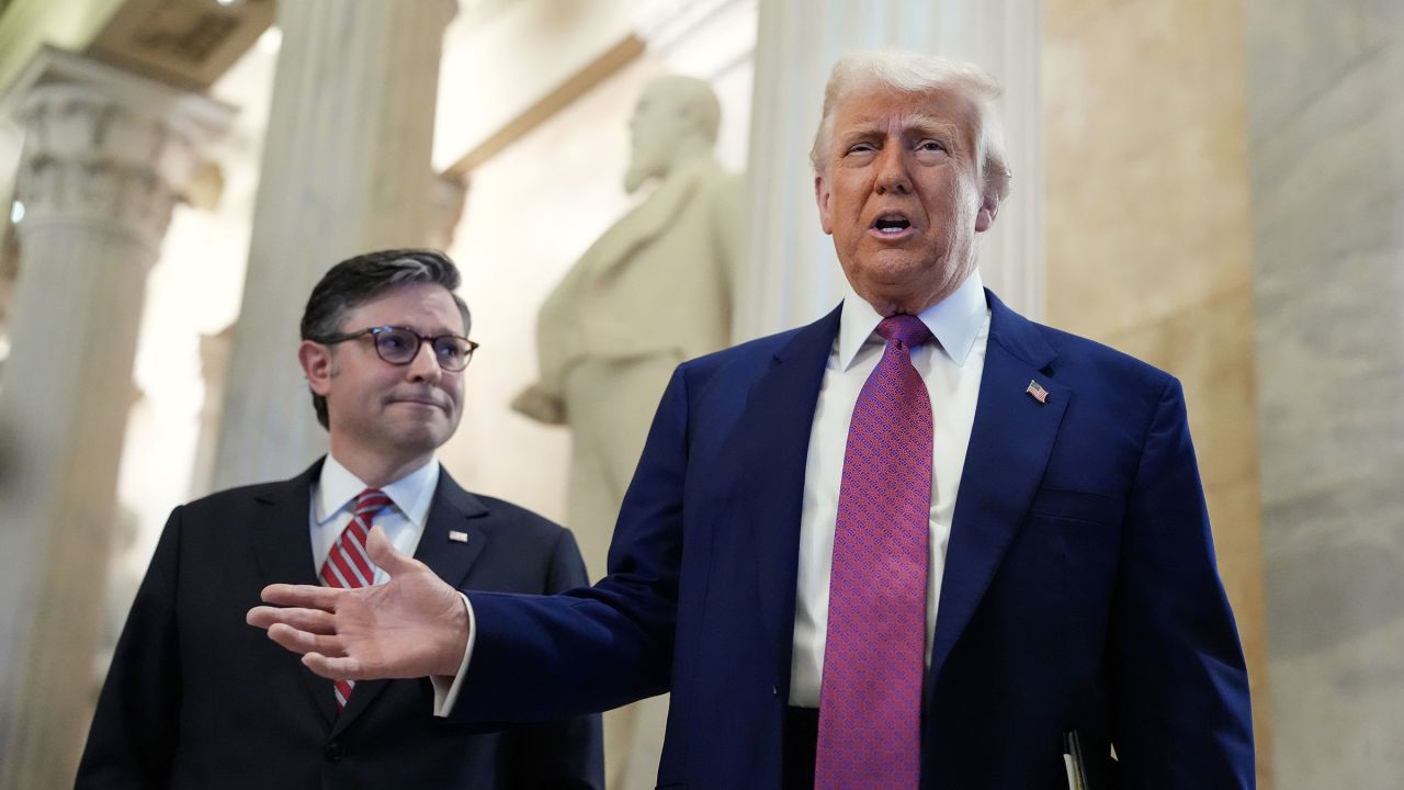 President Donald Trump arrives with House Speaker Mike Johnson for a House Republican meeting at the US Capitol on May 20.