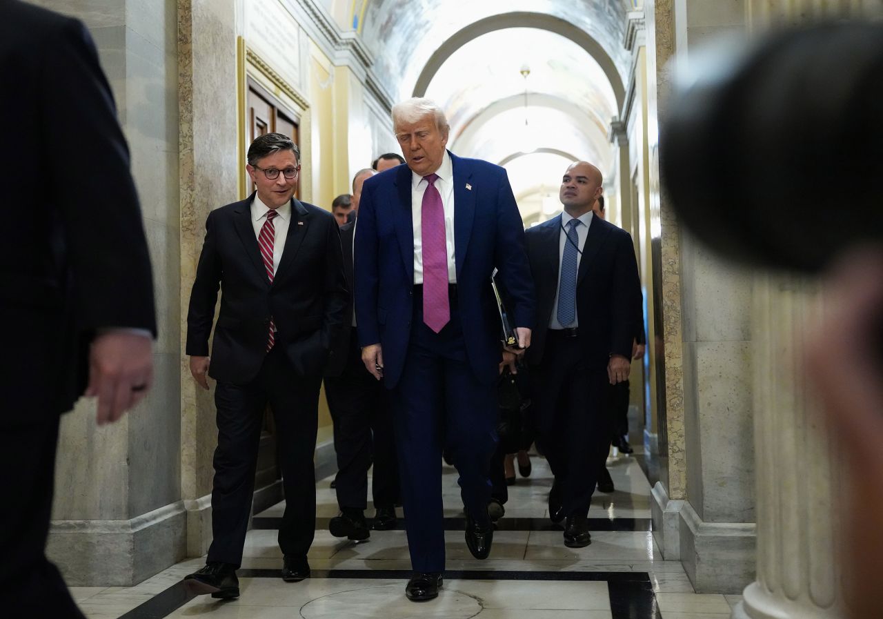 President Donald Trump arrives with House Speaker Mike Johnson for a House Republican meeting at the US Capitol in Washington, DC, on Tuesday.