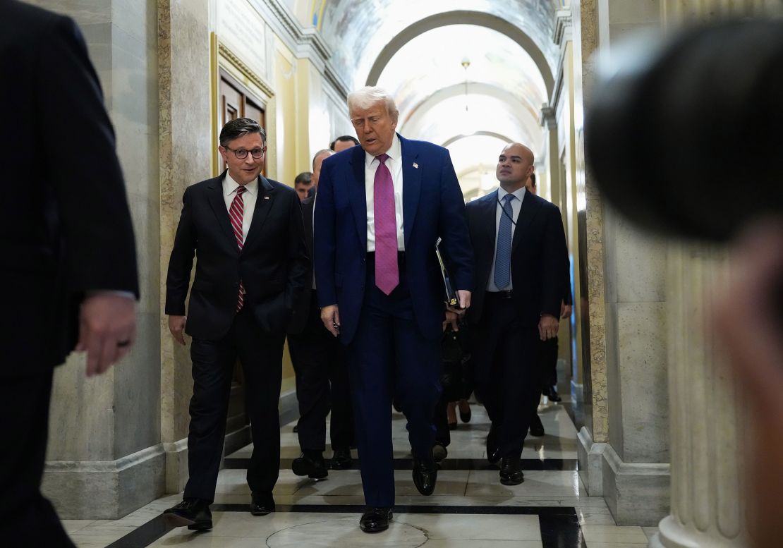 President Donald Trump arrives with House Speaker Mike Johnson for a House Republican meeting at the US Capitol on May 20 in Washington, DC.
