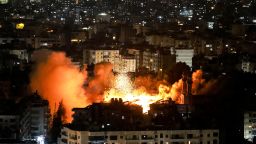 Smoke and fire erupt from the site of an Israeli airstrike on Beirut's southern suburbs on June 5.
